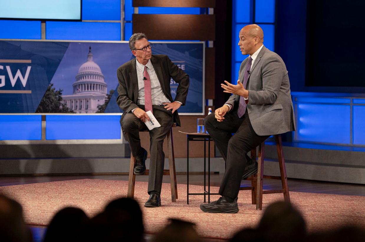 (Sen. Cory Booker (D-N.J.) and GW’s Frank Sesno discussed how to heal the political divide in the United States at the inaugural event for The Sesno Series. (Jordan Tovin/GW Today))