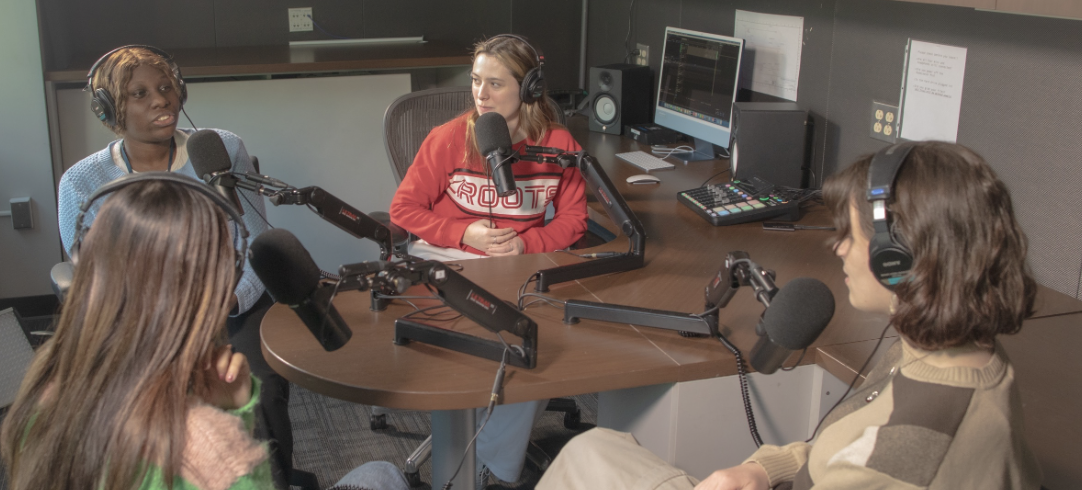 Students recording a podcast in the SMPA Podcast Studio