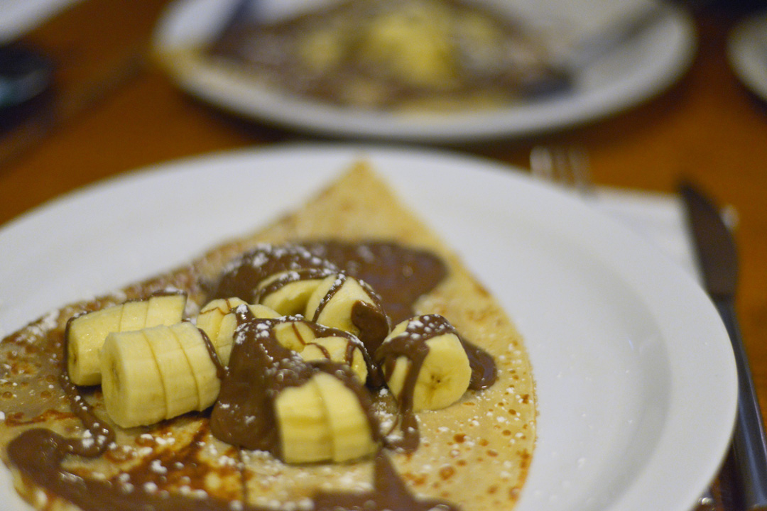 crepe with bananas and chocolate sauce