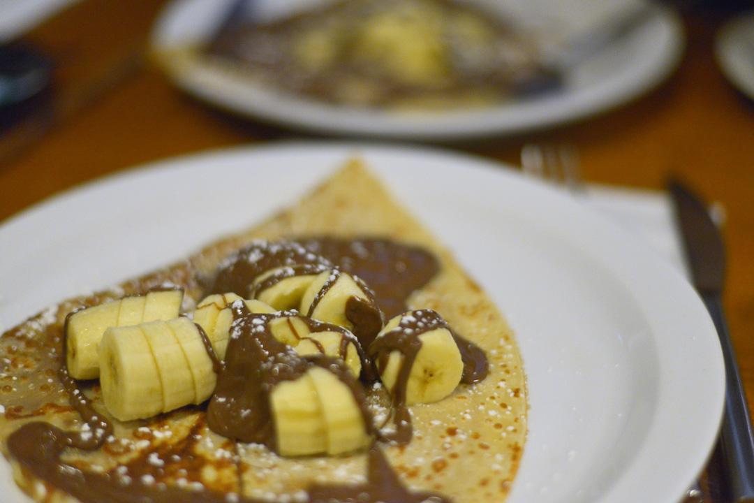 crepe with bananas and chocolate sauce